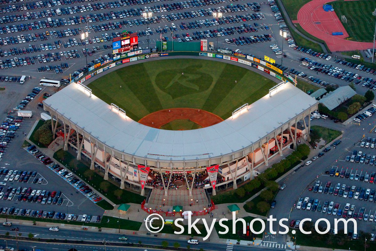 Stadium surrounded by parking lot