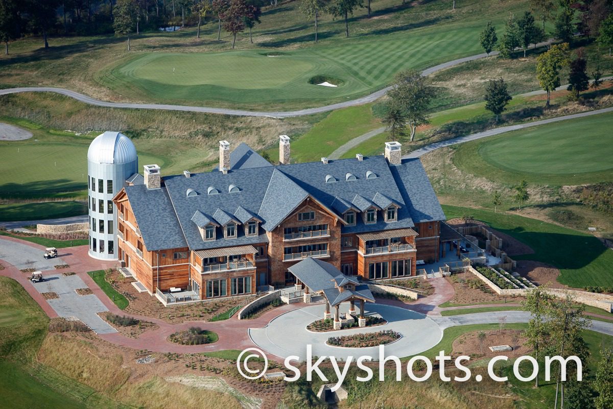 Large lodge with surrounding golf course