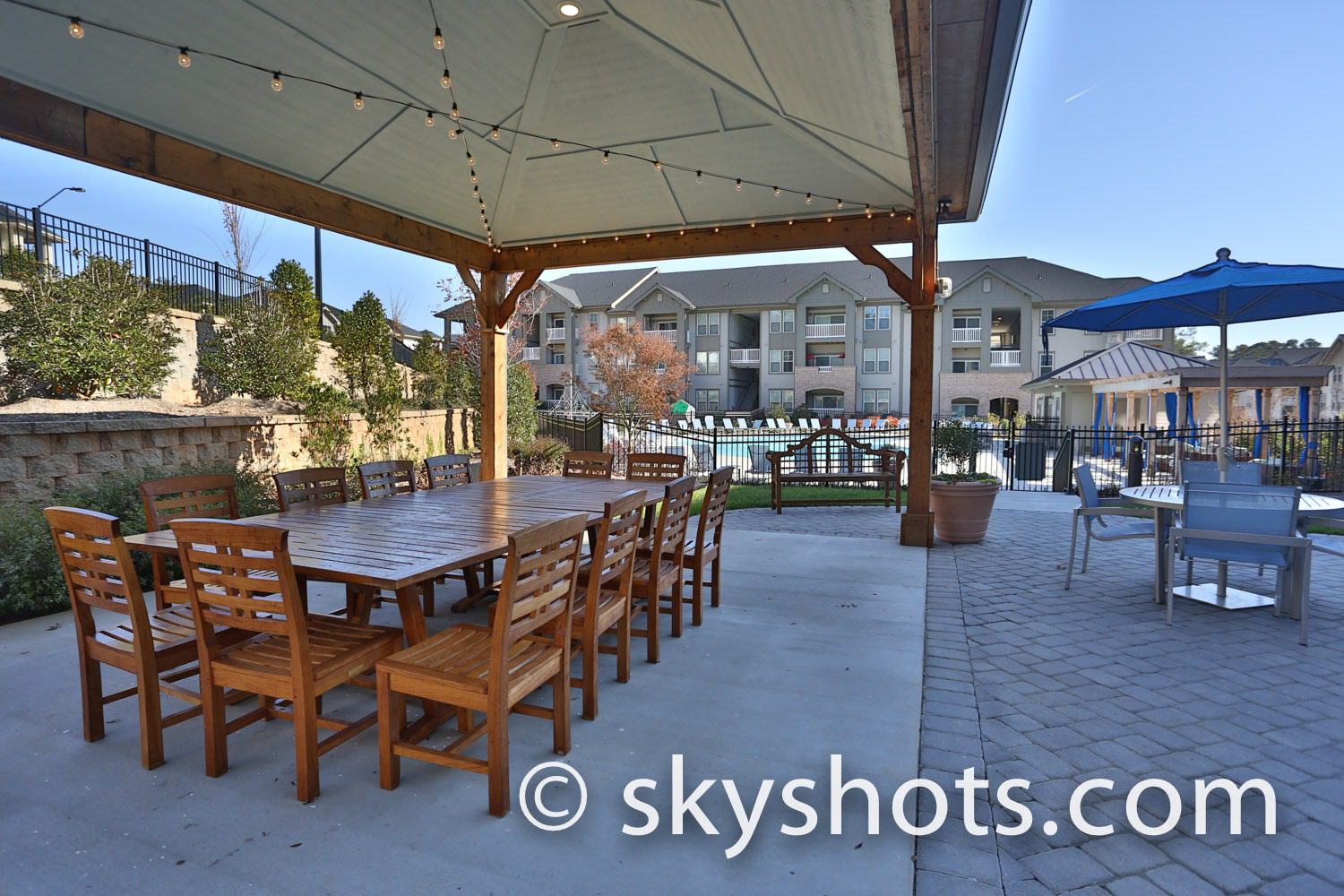 Outdoor dining area with wooden chairs