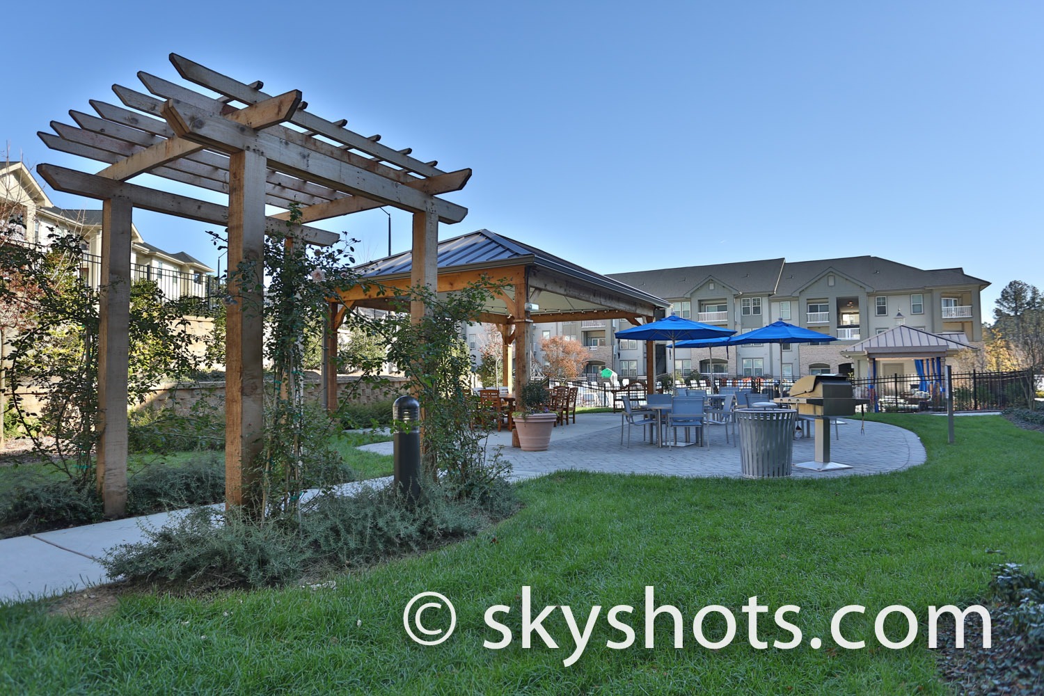 Outdoor patio with seating and pergola